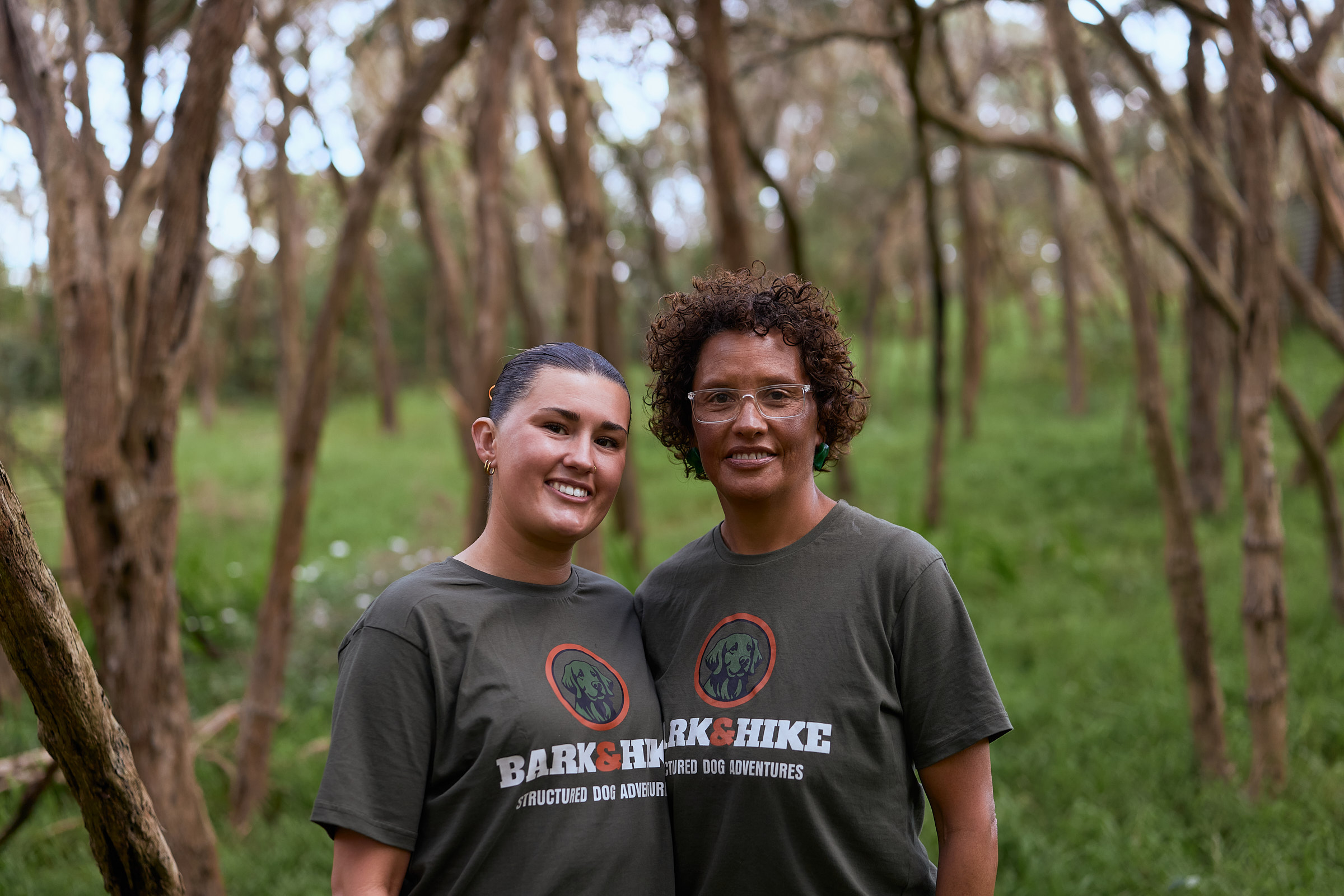 Two Bark & Hike team members together in the bush